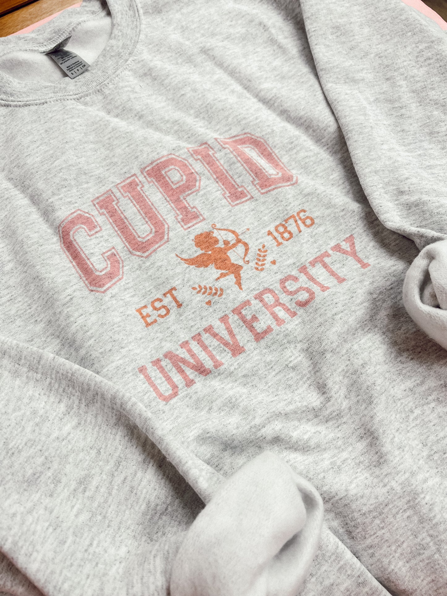 Cupid University Graphic